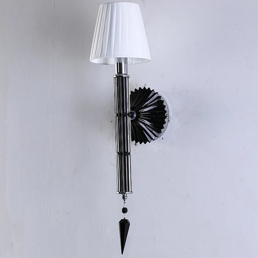 Close-up of the champagne crystal detail on the wall sconce.
