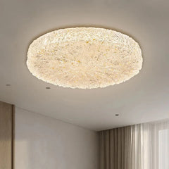 Interior view showcasing a gold resin textured flush mount ceiling light on a ceiling