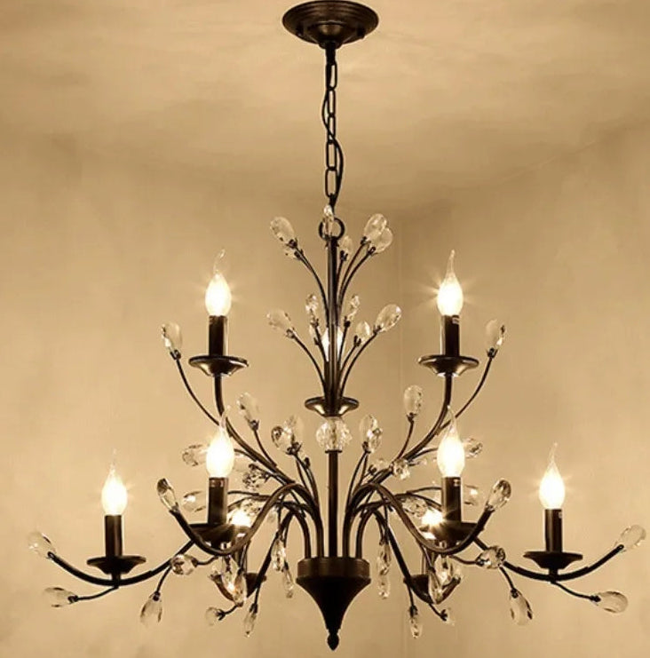 Chandelier with multiple lights on a beige wall background
