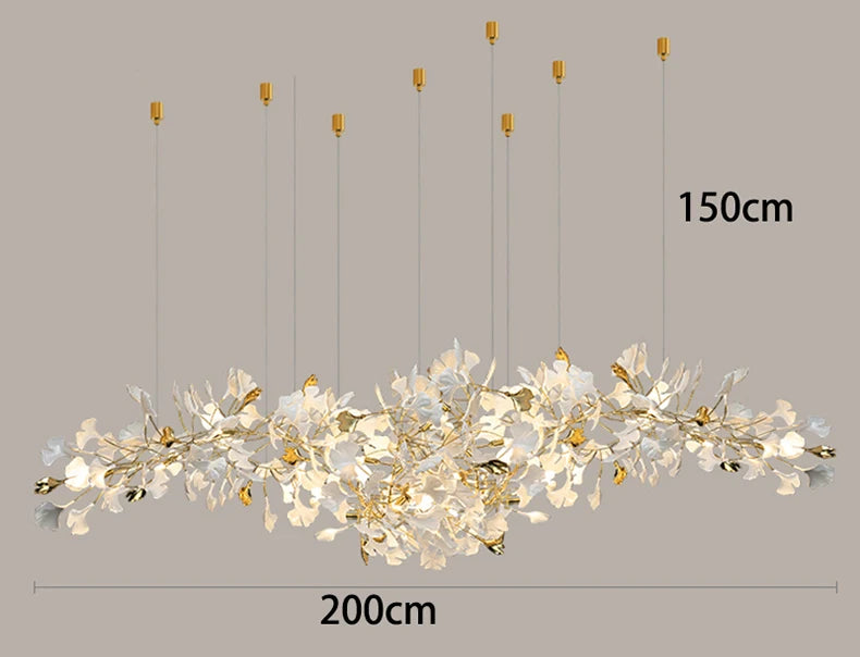 Long decorative chandelier with branch-like design on a gray background