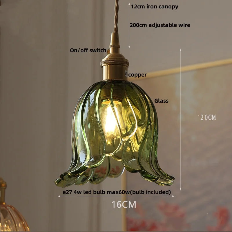 Green floral pendant light with measurements and details on a neutral background