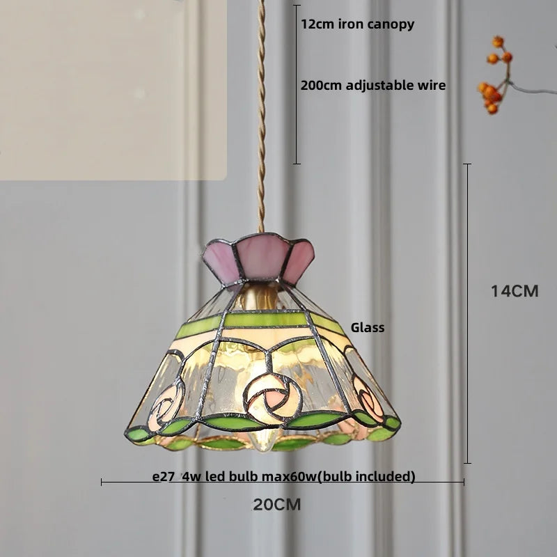 Stained glass pendant light with dimensions and bulb information on a neutral background
