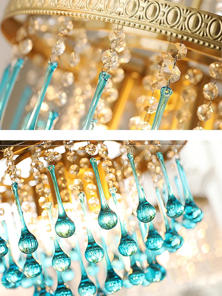 Close-up of an ornate chandelier with blue crystal pendants.