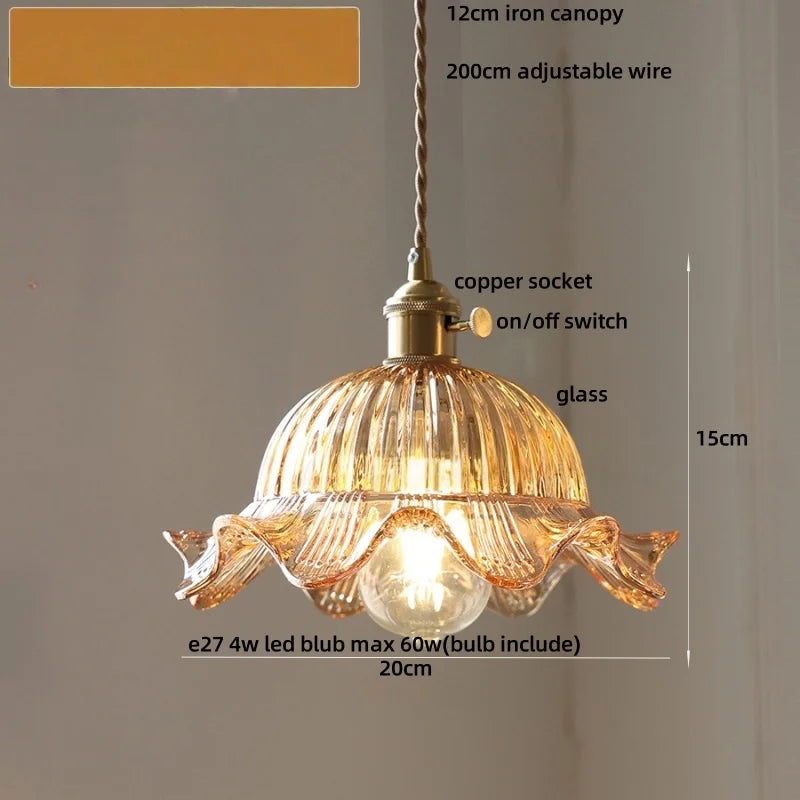 Decorative pendant light with labeled parts on a plain background