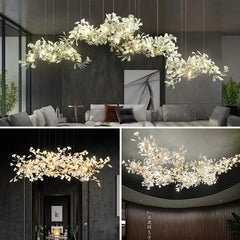 Close-up of the gold ginkgo leaf details on a cascading chandelier.