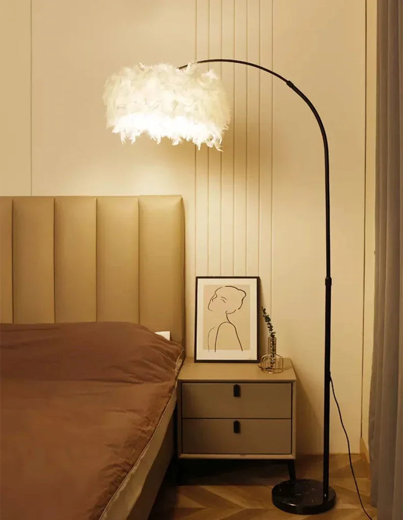 Floor lamp with a decorative shade in a bedroom setting.