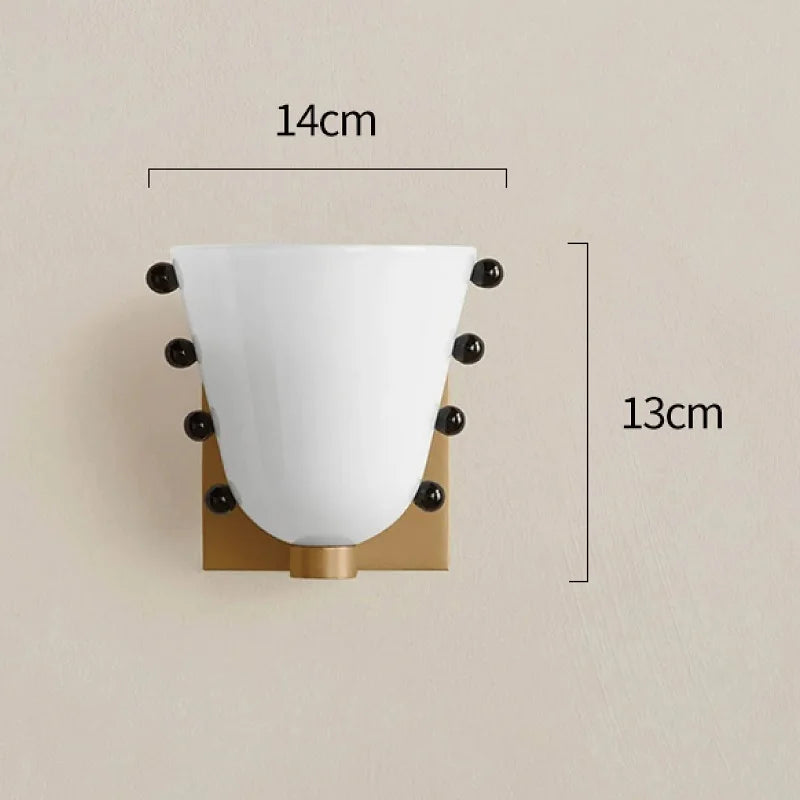 Wall sconce with measurements on a beige background