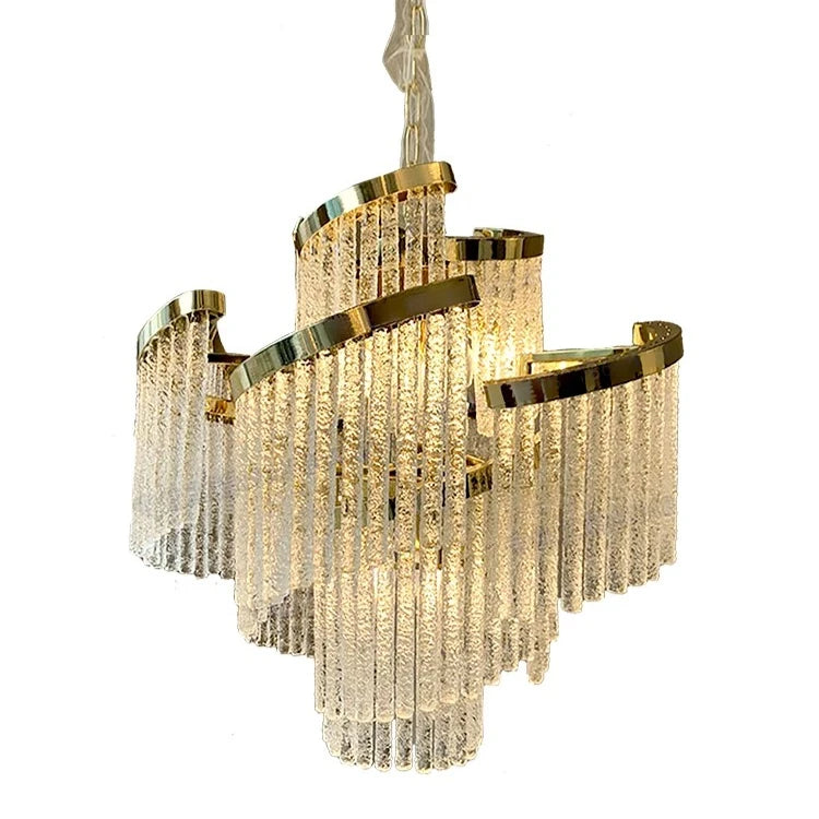 Chandelier with gold accents and crystal-like elements on a white background