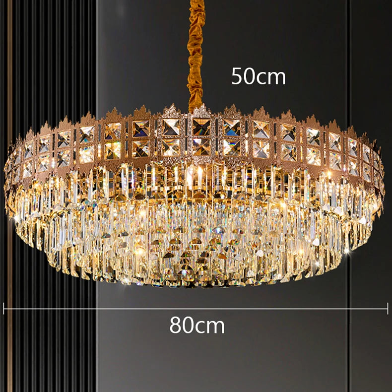 Gold chandelier with dimensions on a black background