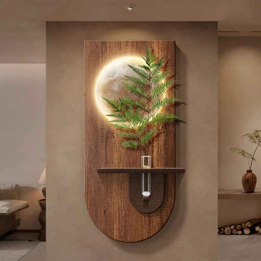 Close-up view of the modern wood grain wall light, highlighting the texture and the integrated LED illumination surrounding a green plant.