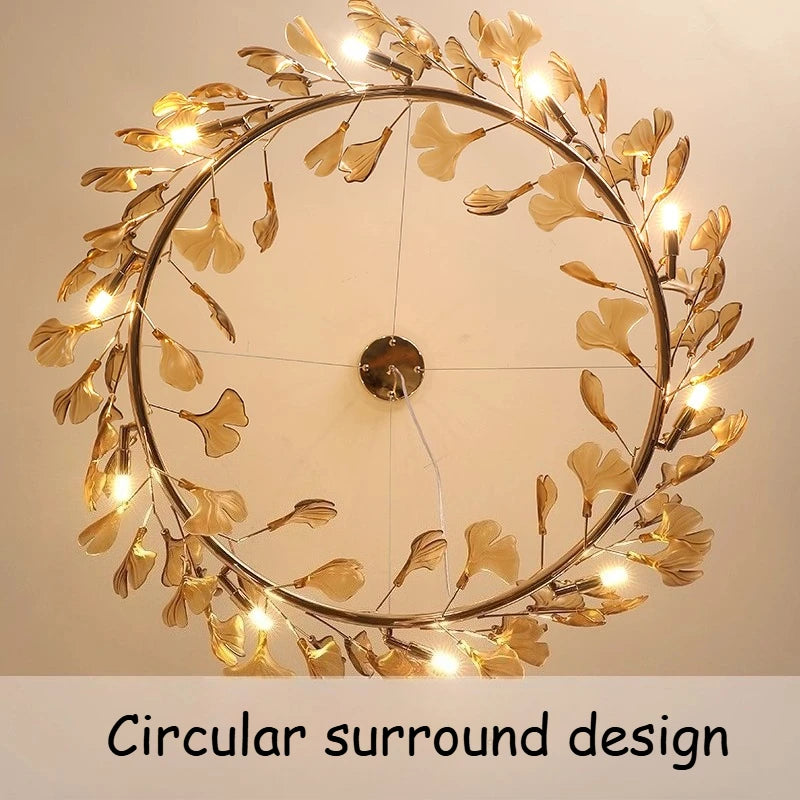 Top-down view of the circular surround design of the gold leaf chandelier.