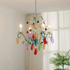 Side view of a gold floral fruit crystal chandelier with colorful teardrop accents and candle-style lights.
