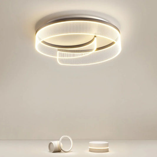 Modern double ring semi-flush ceiling light with integrated LED illumination.