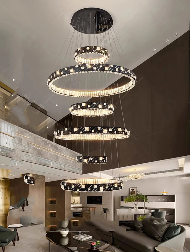 Modern chandelier hanging in a stylish living room