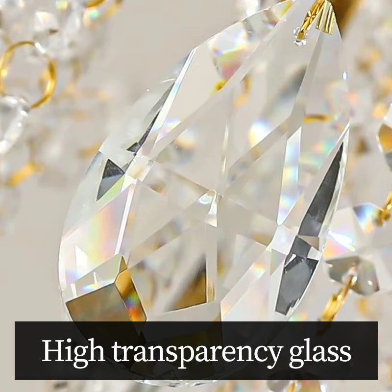 Clear glass teardrop pendant with high transparency on a blurred background