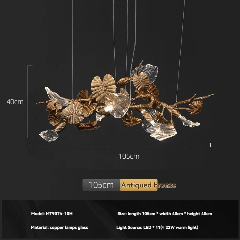 Decorative chandelier with leaf design on a black background