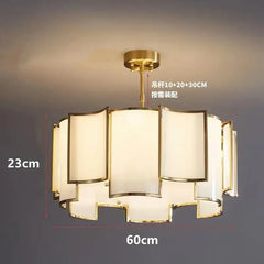 A diagram of the gold tiered pendant light with dimensions indicated: 23cm height and 60cm width, with adjustable pole options.