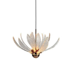 A single clear acrylic lotus flower pendant light shown against a white background, highlighting its petal design and central light source.