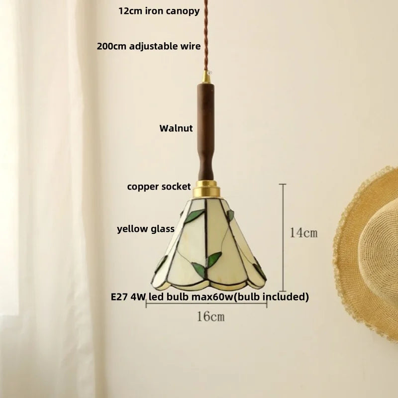 Detailed diagram of a pendant light with labeled parts on a beige background