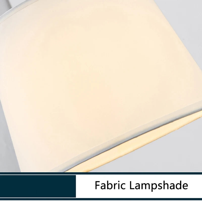 Close-up of a fabric lampshade with a neutral color palette.