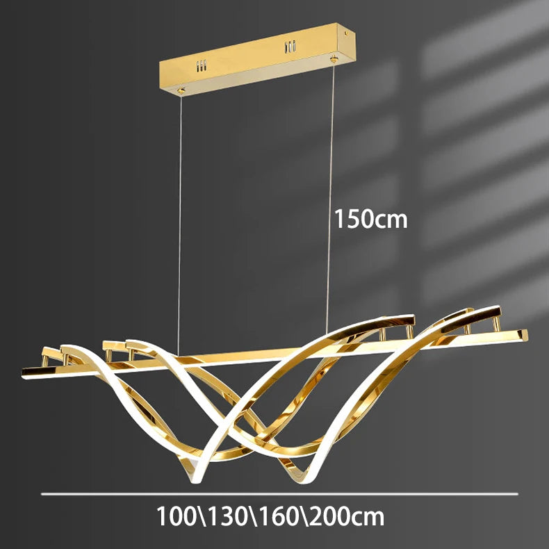 Gold pendant light fixture with adjustable length on a dark background