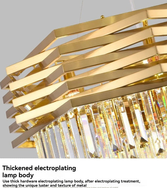 Gold chandelier with crystal accents on a gray background