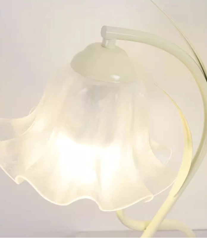 White lamp with a soft glow on a light gray background