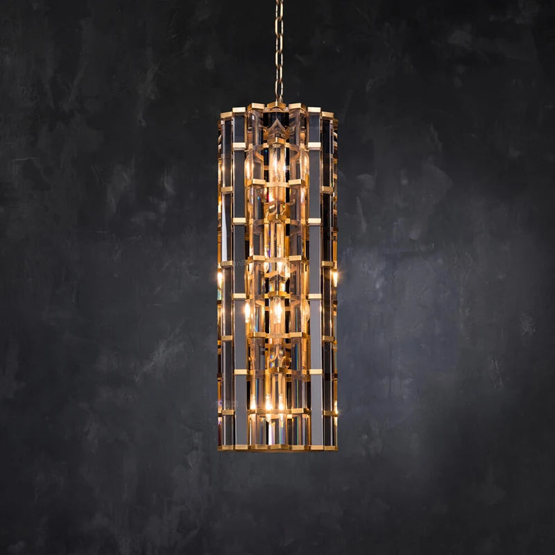 Tall gold framed pendant light with faceted crystal details