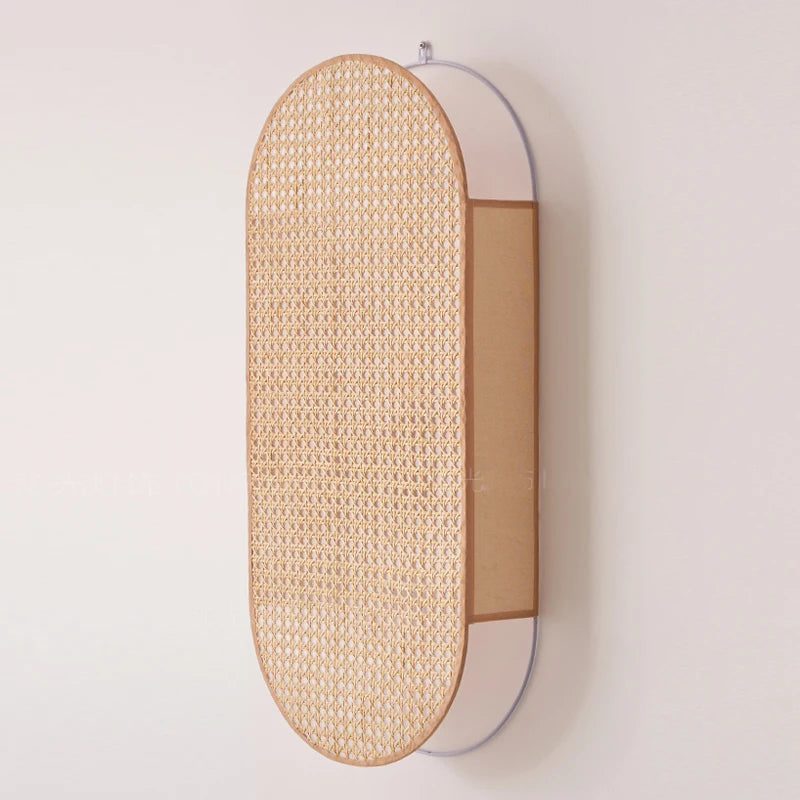Wall-mounted light fixture with woven design on a plain background