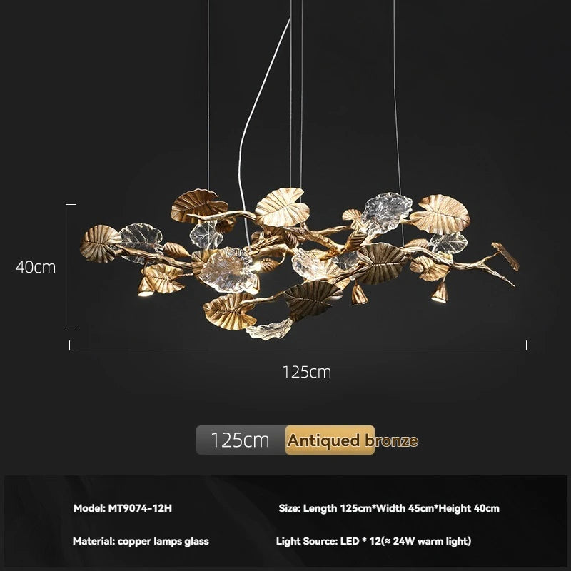 Decorative chandelier with leaf design on a black background