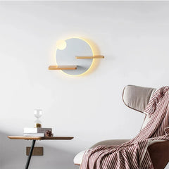 Round wall sconce with wood shelves and USB port installed next to a chair and side table in a living room setting.