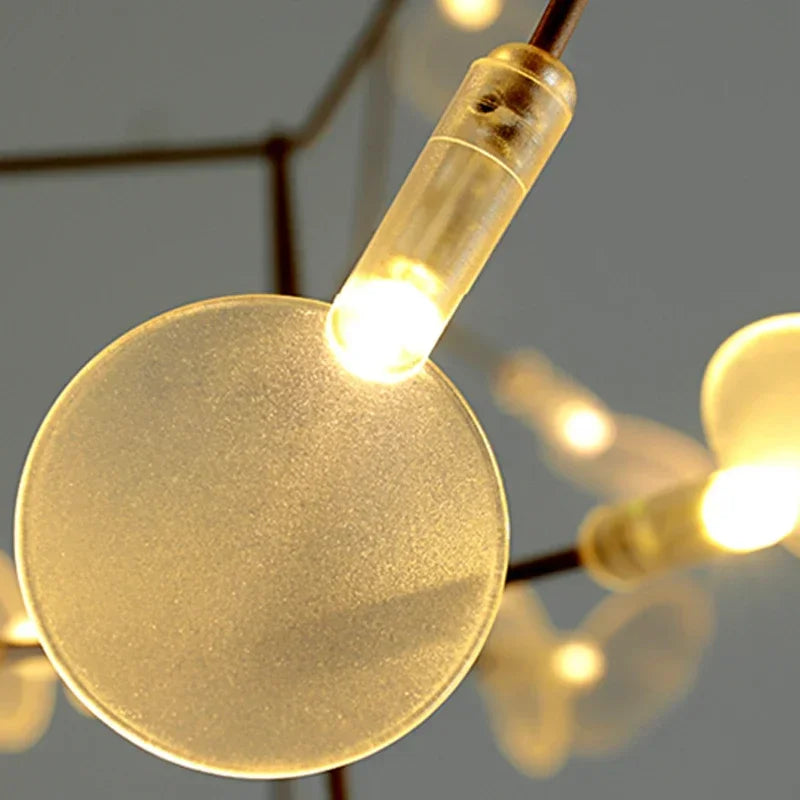 Close-up of a gold light bulb with a blurred background