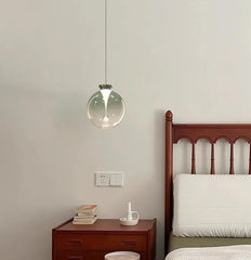 Glass Globe Pendant Light with Brushed Gold Metal Frame Accents