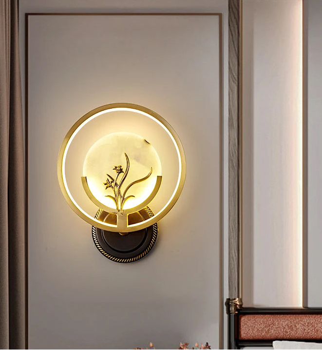Decorative wall light fixture on a wall with a neutral background
