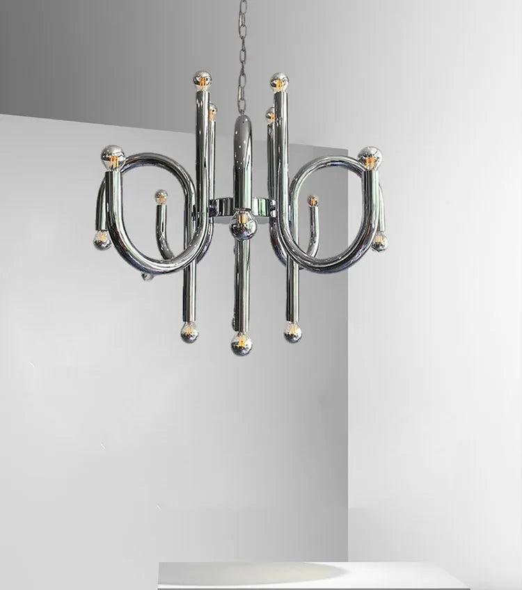Modern chandelier with metallic design on a neutral background