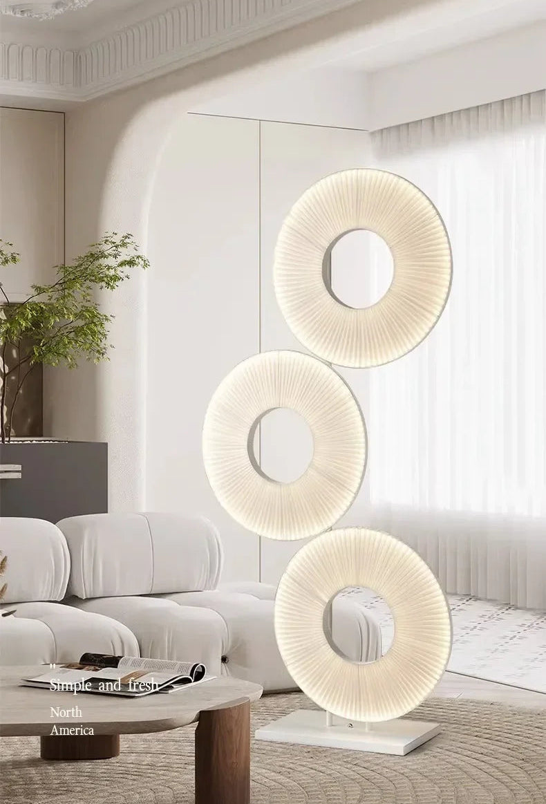 Decorative lamp with circular design in a modern living room setting