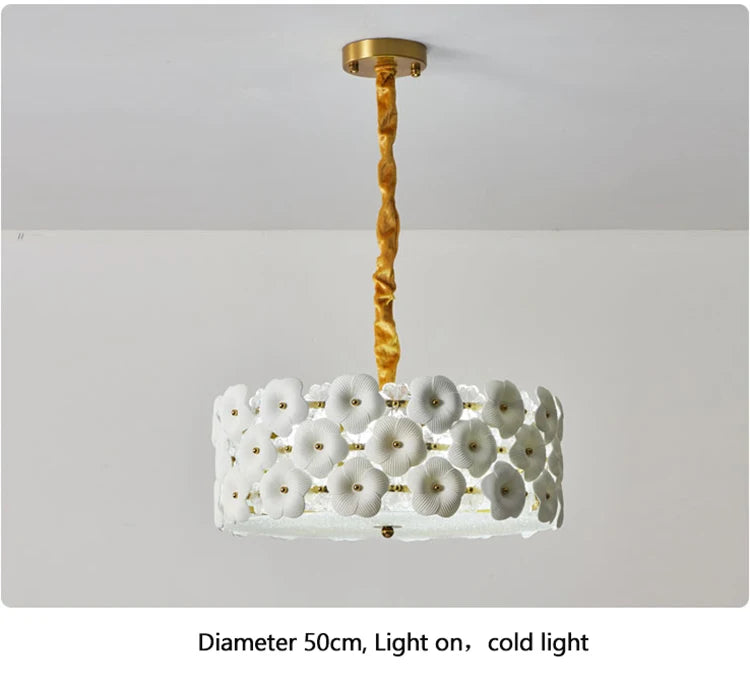 Chandelier with floral design on a plain background