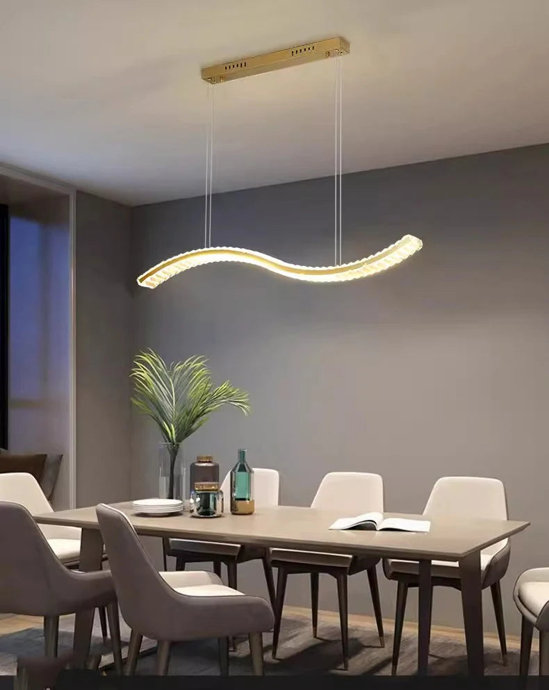 Modern dining room with a hanging LED pendant light