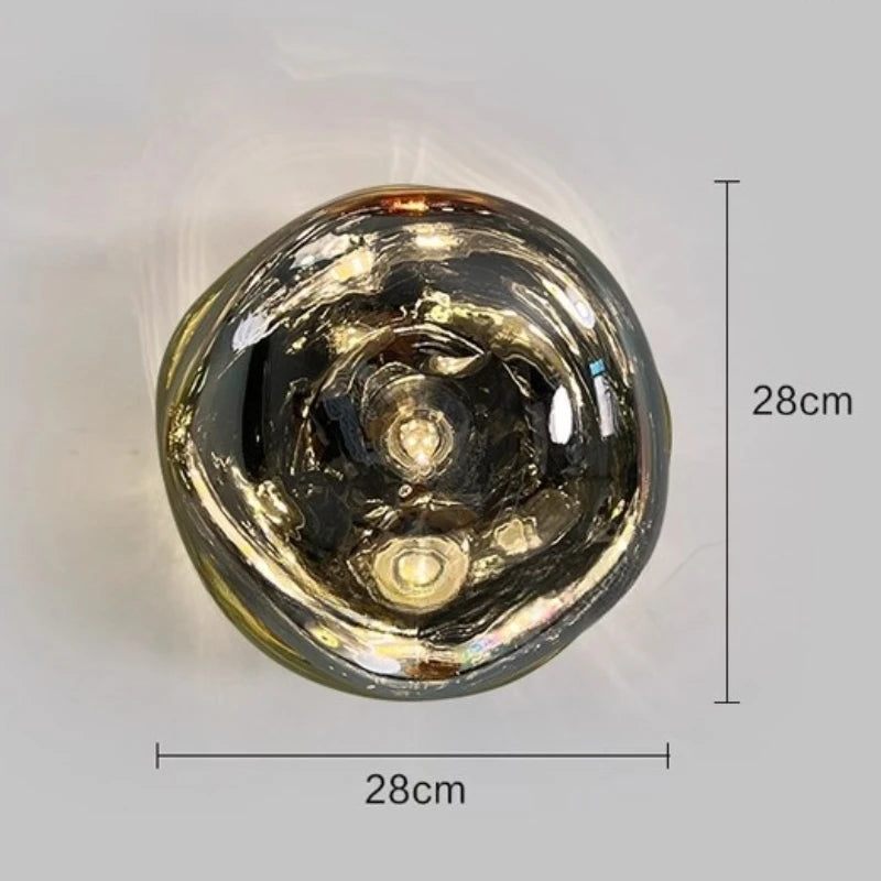 Close-up of a metallic object with dimensions indicated on a light gray background