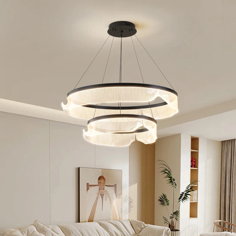 Modern chandelier in a living room setting with neutral colors