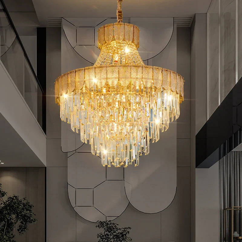 A luxurious gold chandelier with multiple tiers of sparkling crystals, showcasing its intricate design in a grand interior.