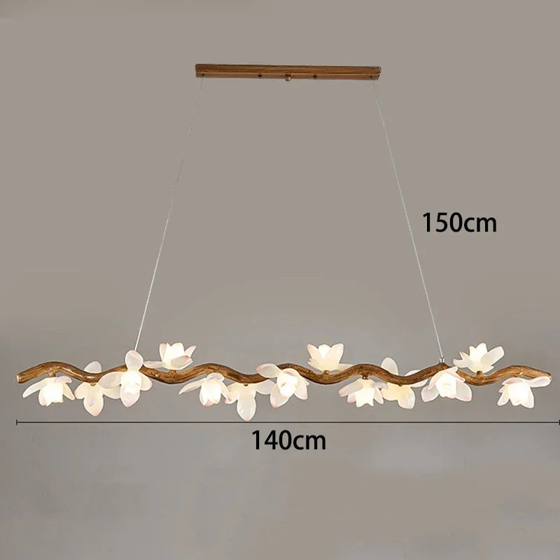 Chandelier with floral design and measurement labels on a plain background