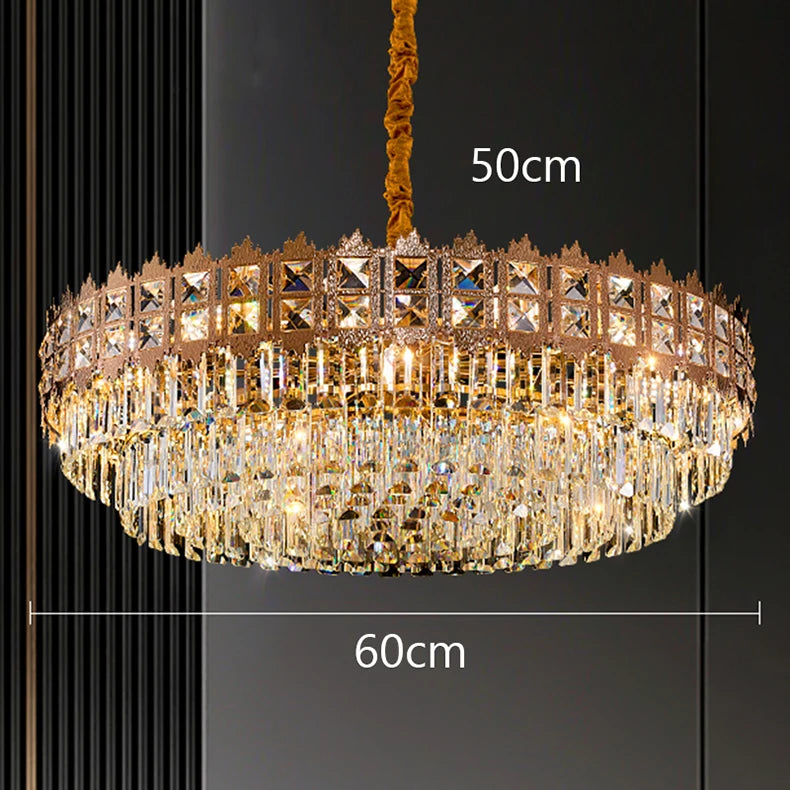 Gold chandelier with dimensions indicated on a dark background
