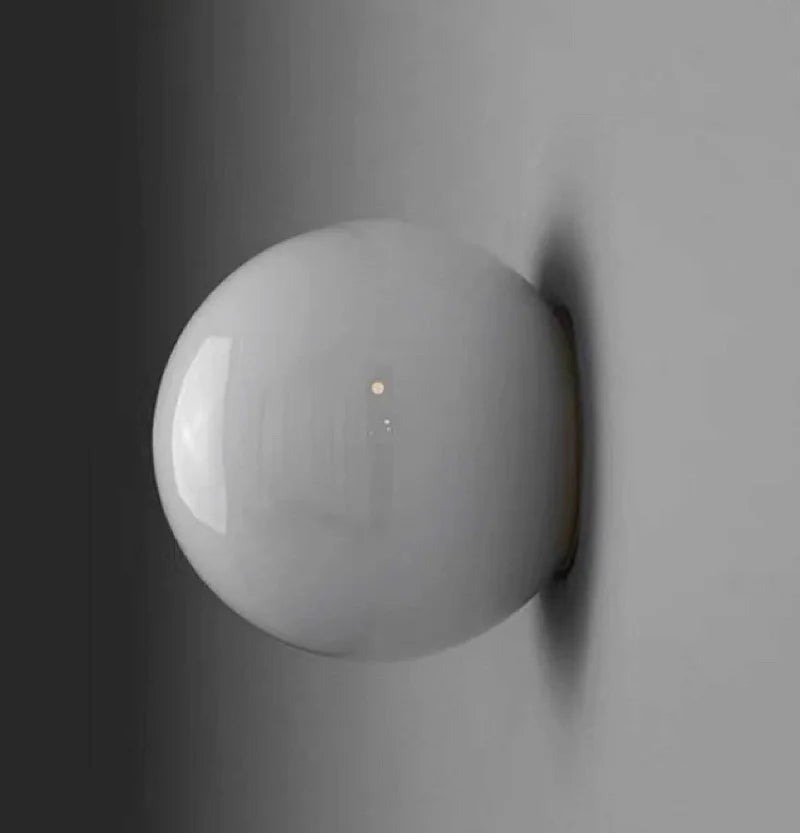 Close-up of a white spherical object on a gray background