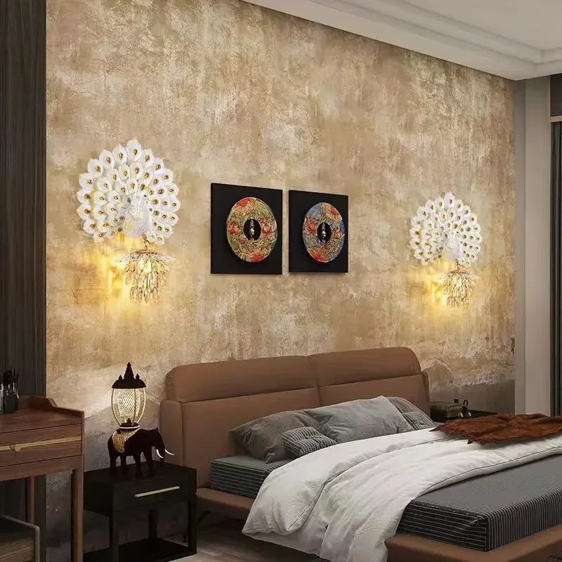 Modern bedroom with decorative wall lights, artwork, and a bed.