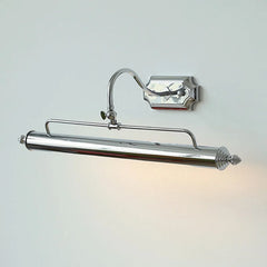A close-up of a silver-colored linear wall sconce with an adjustable arm and shade, illuminated.