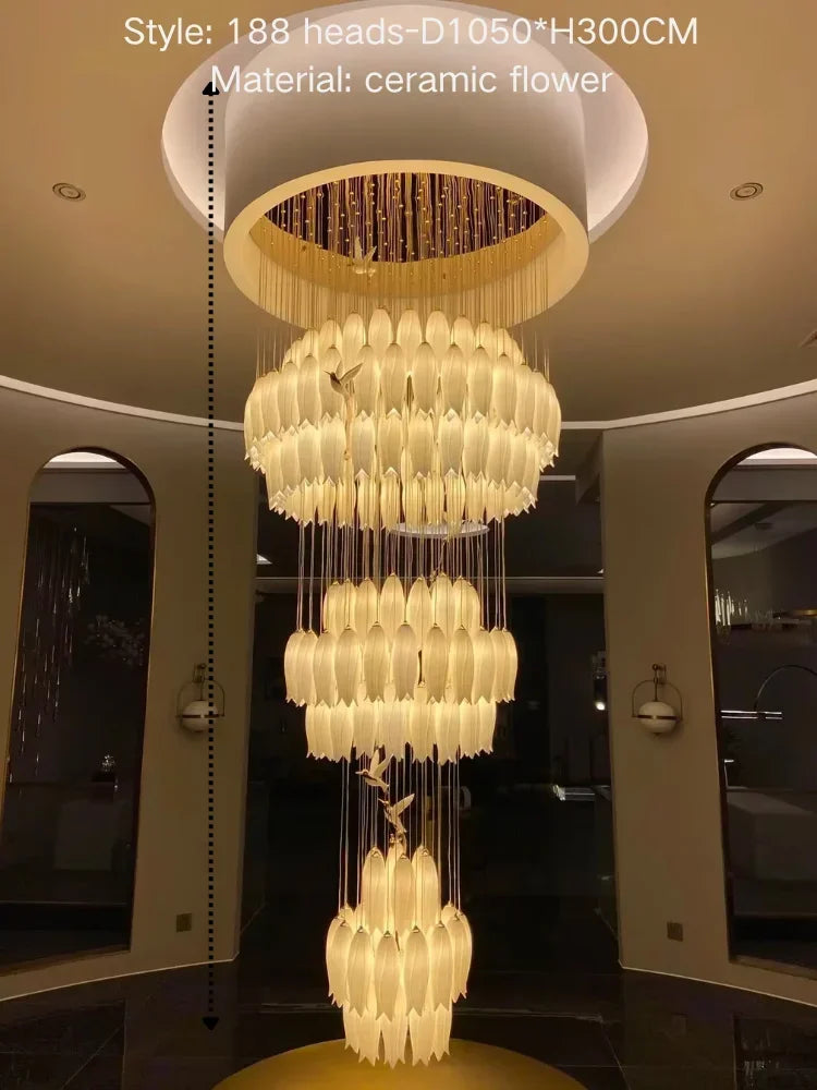 Large ceramic flower chandelier hanging in a room with arches.