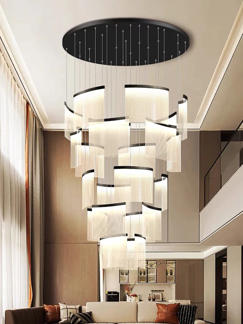 Modern chandelier hanging in a stylish living room