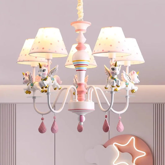 Pink and white chandelier with unicorn figurines and polka dot fabric shades, flush mount style.