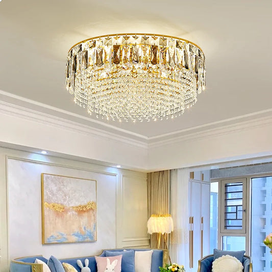 Close-up view of the gold metal frame and crystal droplets on the chandelier.
